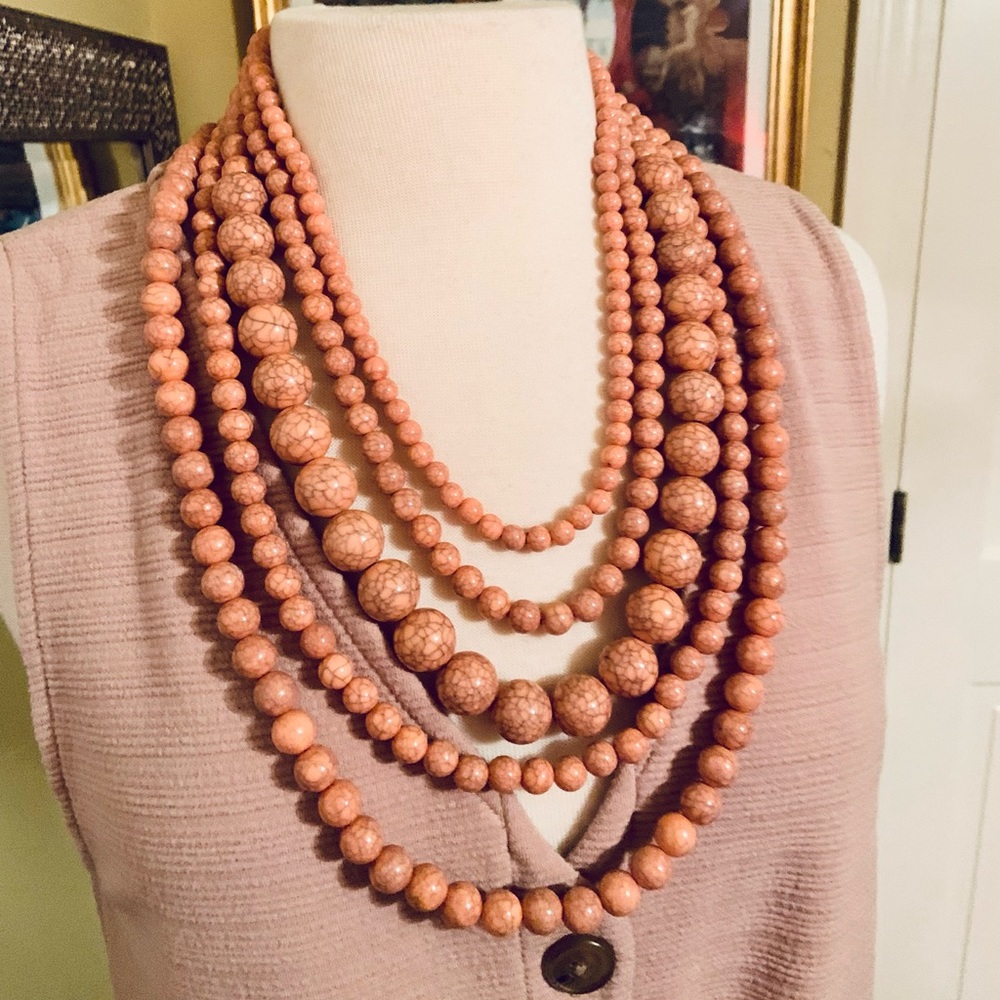 NWOT Pink beaded multi strand necklace. Excellent condition.